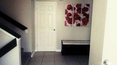 Entry with new wood banisters.