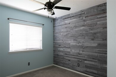 Third bedroom with lovely accent wall.