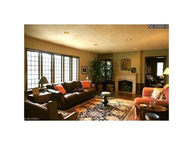 Sunny Living room with oversized leaded glass wind
