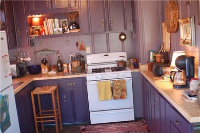Great size kitchen with window over sink.  Nice painted cabinets and all appliances remain.
