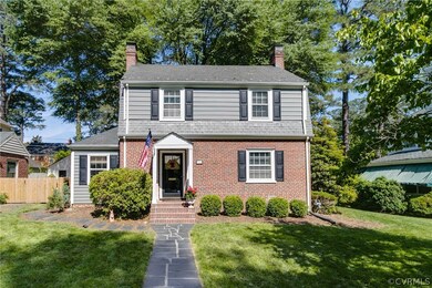 Brick and slate Dutch Colonial.