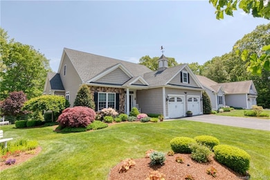 The well manicured property features a sprinkler system, as well as an invisible dog fence.