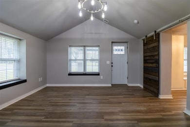Lots of natural light in this living area. Barn do