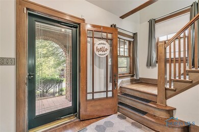 Main foyer with beautiful woodwork.