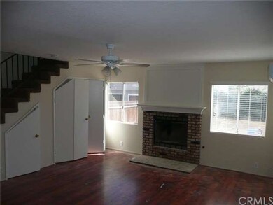 Large family room with brick wood burning fireplac