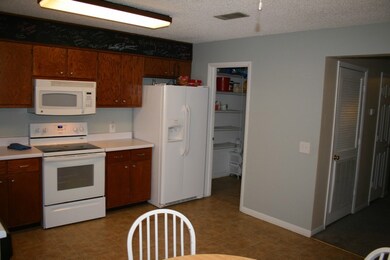 ADDITIONAL PANTRY SHELVING IN UTILITY ROOM ALONG W