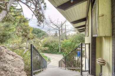 Top of stairs going to driveway