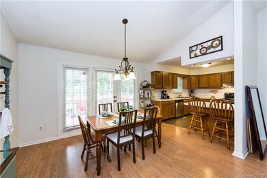 Dining Area leads to the back deck and the kitchen