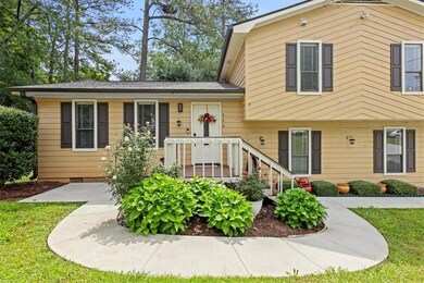 Split level home featuring crawl space and a front yard