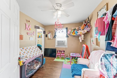 picture of primary bedroom from another angle