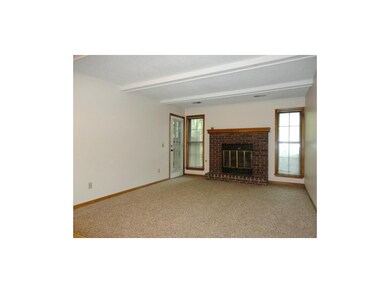 Spacious Living Room with Fireplace