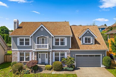 Cedar shake roof was cleaned and treated in 2016 and provides a beautiful, warm look to the home.