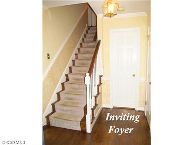 Foyer - FEATURING HARDWOOD FLOOR, CHAIR RAIL, CROW