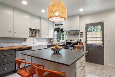 Subway tile backsplash and butcher block counters