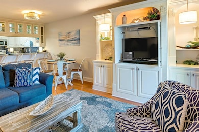 Living area with light wood-type flooring and baseboards