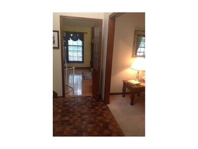 View from front door into family room and formal l