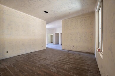 Unfurnished room featuring dark hardwood / wood-st