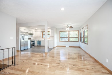 Dining area open to living room and kitchen