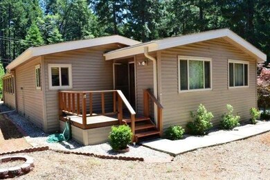 Cute front deck area leads you into the front of t