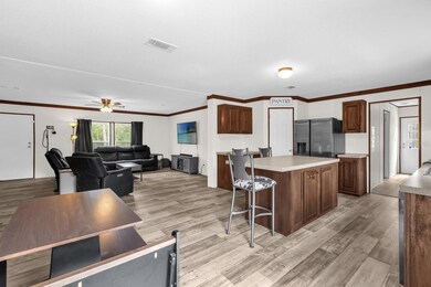 View of kitchen and living from dining room
