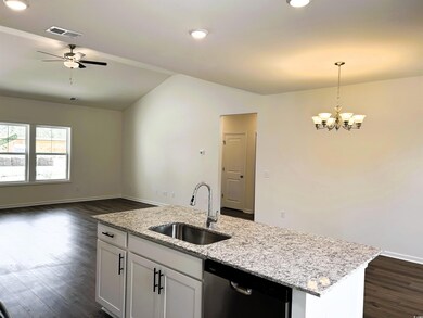 Kitchen with visible vents, dishwasher, a sink, da