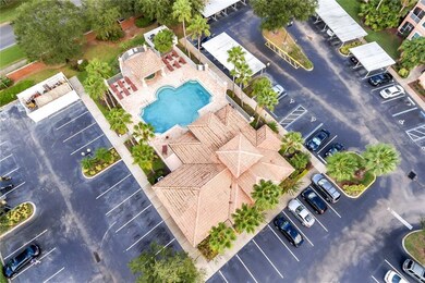 Aerial view inside community..assigned parking spot right across pool