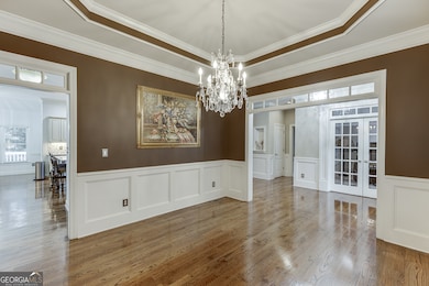 Dining room connects directly to the kitchen and main hallway.