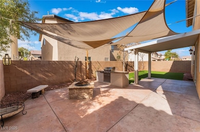 View of patio / terrace with exterior kitchen, a g