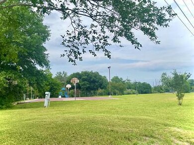 View of home's community with a yard and community
