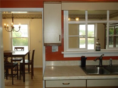 The kitchen has the original window above the sink