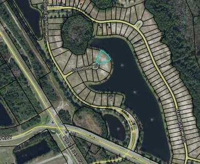 Aerial view of lot with entrance to community