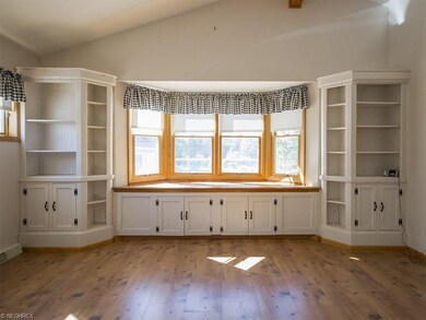 Custom built-ins and a sunny window bench in the g