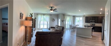 Living room featuring light wood finished floors,