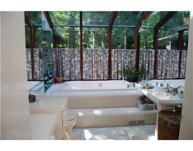 Master Bath/Spa. Raised whirlpool tub set against