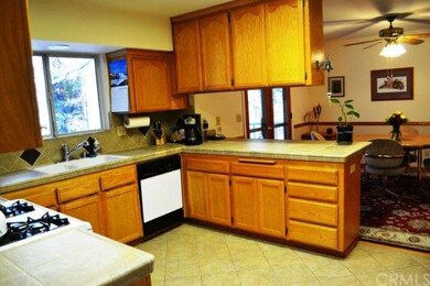 The kitchen has a nice layout with lovely tile flo