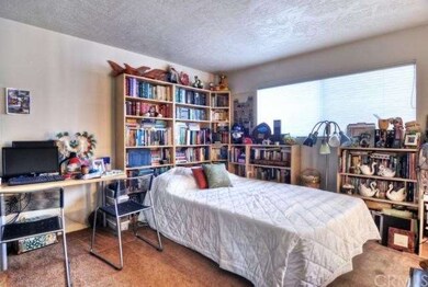 Main floor bedroom with attached bathroom.