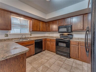 The kitchen comes with a dishwasher, stove, microwave & refrigerator.  No warranties on appliances.