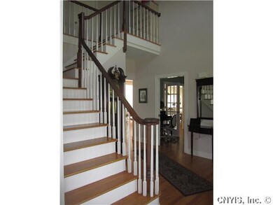 Lobby/Reception Grand 2 Story Foyer  and Oak Stair