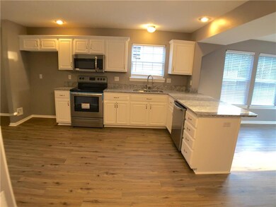 View of kitchen from dining area.