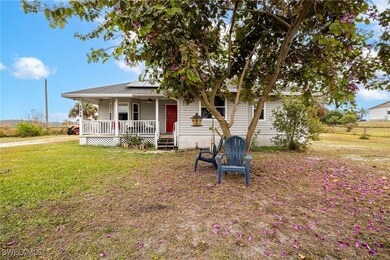 View of front of house featuring covered porch, so