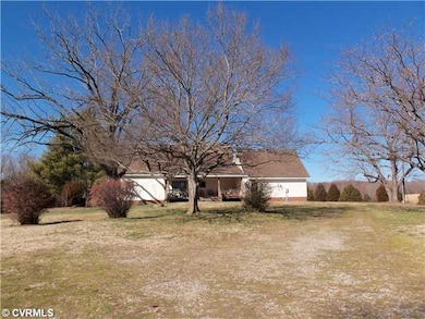 Other - View of rear of home showing large covered