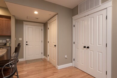 Enter from the hall, on first floor.There is an elevator from the entry level.