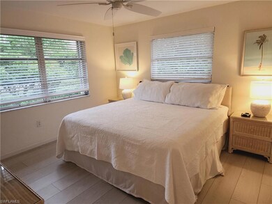 Bedroom featuring light wood-style floors, ceiling
