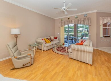Living room with slider to lanai/pool