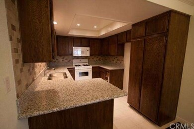 Upgraded kitchen with new appliances, granite coun
