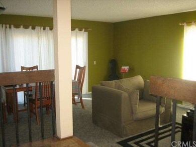 Living room with formal dinning area