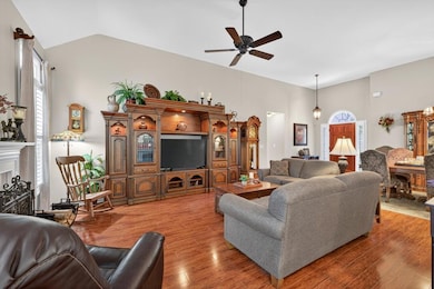Vaulted ceiling & gorgeous hardwood floors in living room