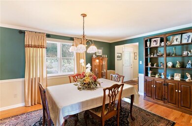 The dining room, just right of the entry, can acco