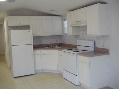 Fully functional kitchen.  A lot of cabinets in th
