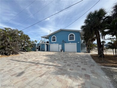 View of side of home featuring a garage
